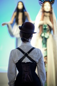To keep laces secure and out of the way, tuck the ends into the bottom of your corset.  Photo: Joel Aron, Corset: Dark Garden, Model: Kristin.