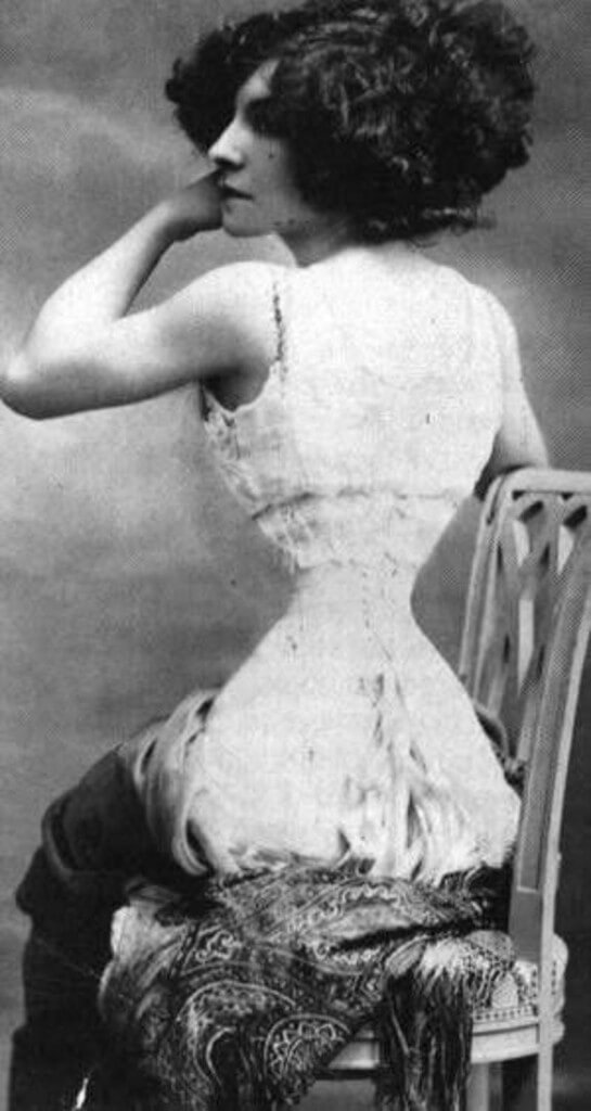 Photograph of famous tightlacing icon Polaire.  (Look a little closer to see how this photo was retouched to make her waist look more extreme.)