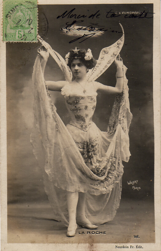 Costumed dancer (?) on postcard, circa 1905. Via les2a on DeviantArt.