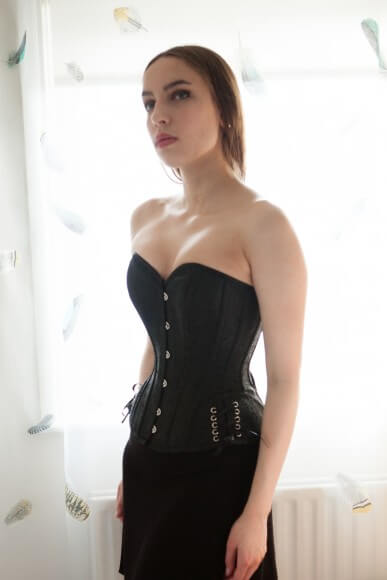 Although difficult to show the full extent in photos, the bust fit was very tight and constricting and caused spillage even on my small bust. Eyelet detail. Overbust with Ribbon Lacing Detail on Hip Panels by Corsets UK. Photo by Karolina Laskowska