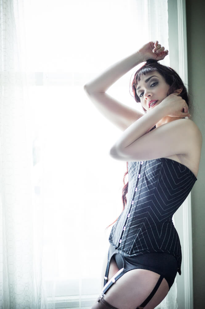 Dollymop for Dark Garden pinstripe corset; model Victoria Dagger; photo © Joel Aron