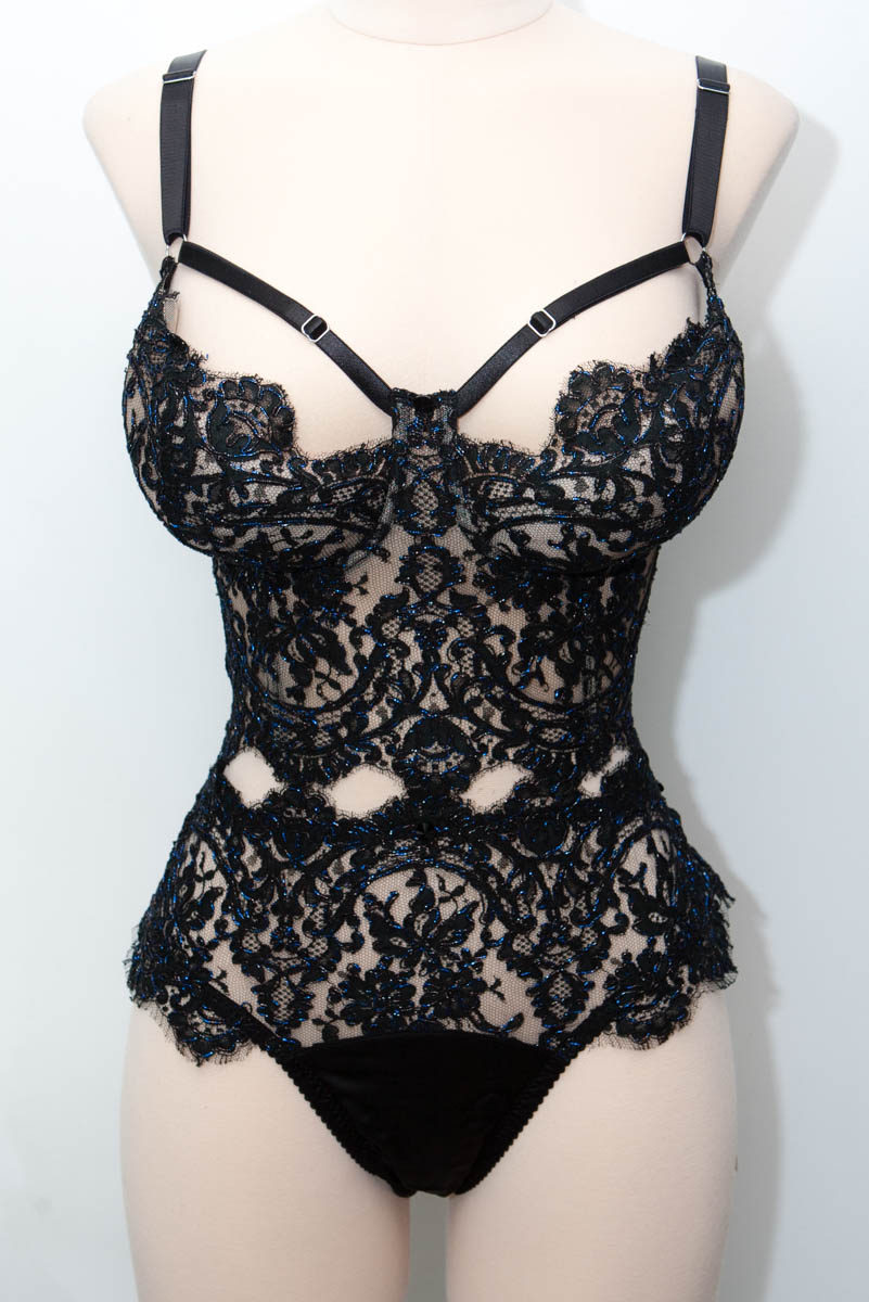 The client's budget for this bespoke lingerie set allowed me to use the expensive scalloped edge of this fine French lace without worrying about cutting costs, making it possible to match the pattern at every seam point. The use of a fine lace's scalloped edge in a design can quickly cause the garment's cost to rise, and using it in RTW design needs very careful consideration and cutting. 'Mina' bespoke lingerie set by Karolina Laskowska.