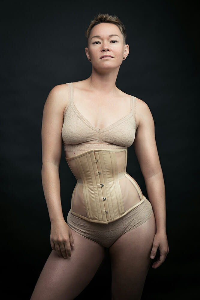 Dark Garden Corsetry campaign featuring queer porn performer Jiz Lee