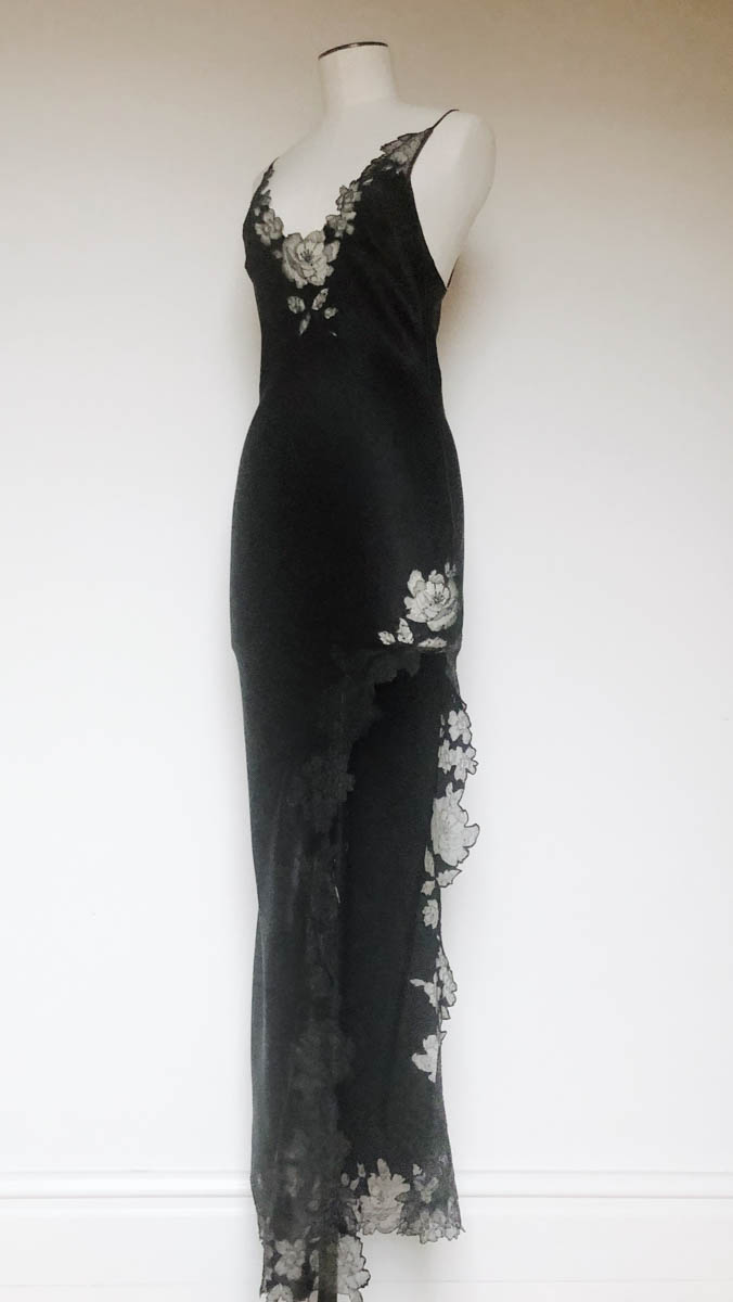 A silk slip with asymmetric cut and lace appliqué embellishment. Photo courtesy of Merle Noir Lingerie