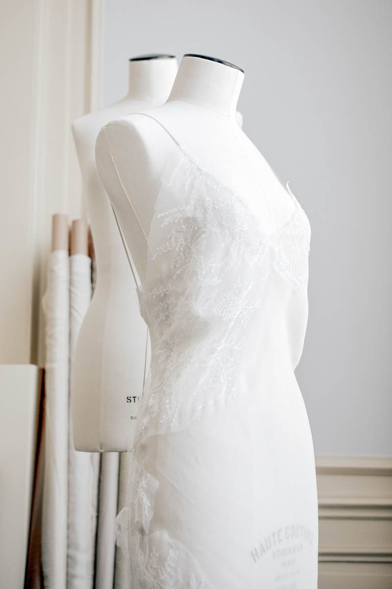 Lace motifs being draped on a mannequin to determine appliqué placement. Photo courtesy of Merle Noir Lingerie