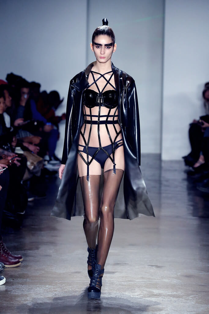 Masculine leather and eyebrows with stockings and garters: is this androgynous? Via Chromat.