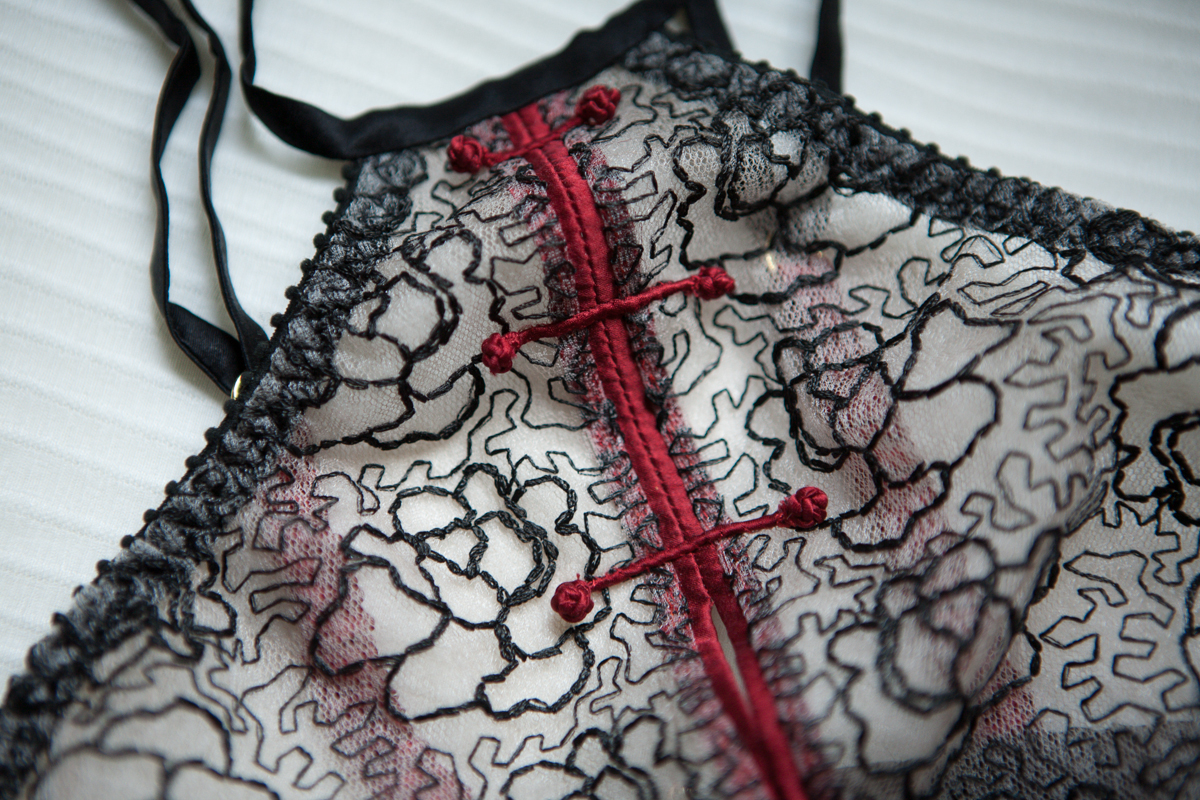 Exquisite silk knot details on the 'Empress Noir' bralet by Pillowbook Lingerie. Photo by K. Laskowska