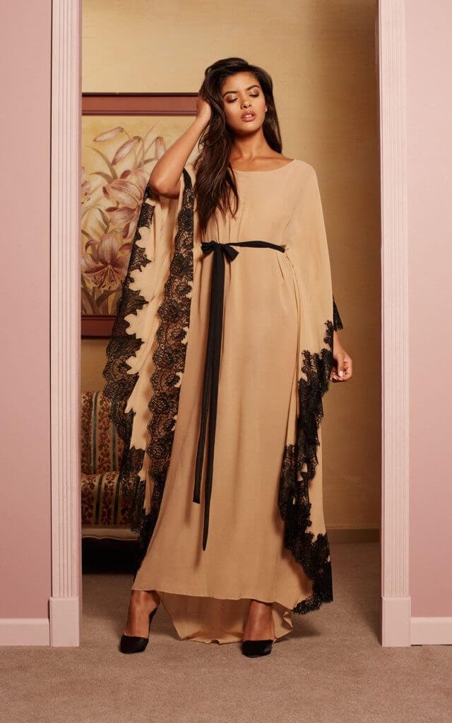 Rosamosario. Lingerie Trends - Luxury Loungewear. Silk caftan style robe in toffee with black lace trim.