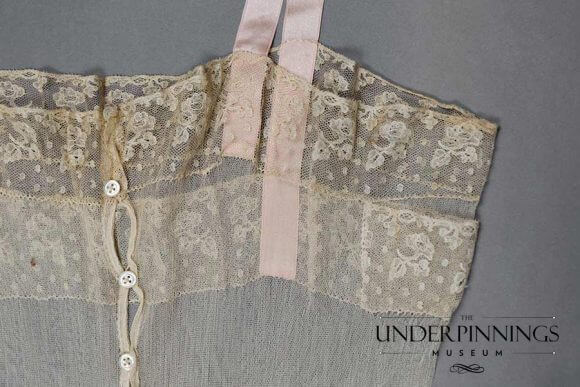 Back detail from a 1910s silk tulle and lace step-in teddy, from The Underpinnings Museum collection. Photography by Tigz Rice Studios