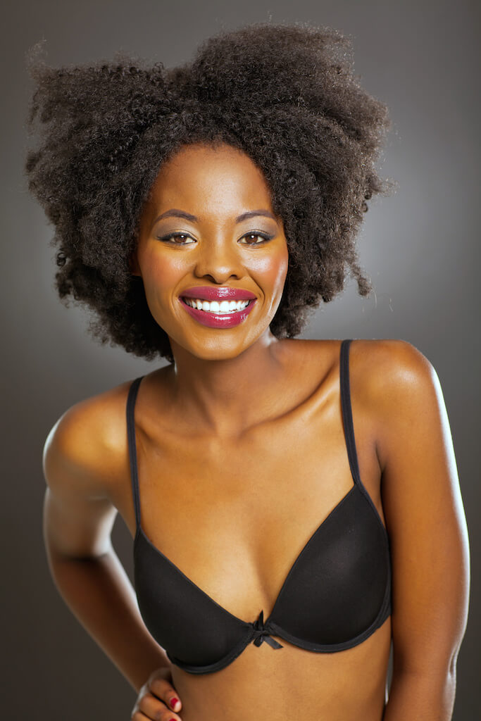 african woman in black bra