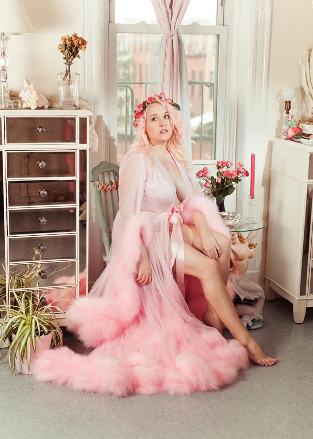 Model wearing Catherine delish sheer, pink, "Cassandra" dressing gown and flower crown. 
