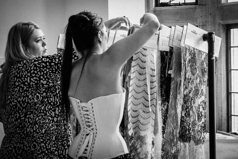 "Corset Fellows" of the Oxford Conference of Corsetry: Alison Campbell and Marianne Faulkner (me) sorting lace samples.