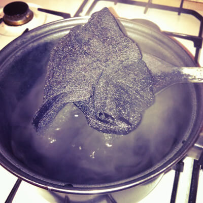 If you’re using disperse dye you should do it on the stove to keep the water boiling. Otherwise the water will gradually cool down and the end result will be a lighter color.