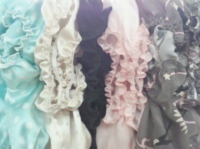 Silk tops by she and reverie hanging in their Manhattan factory