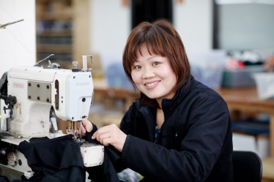 A garment worker at the Dear Kate factory in Queens, NY. Photo by Brister Photo.