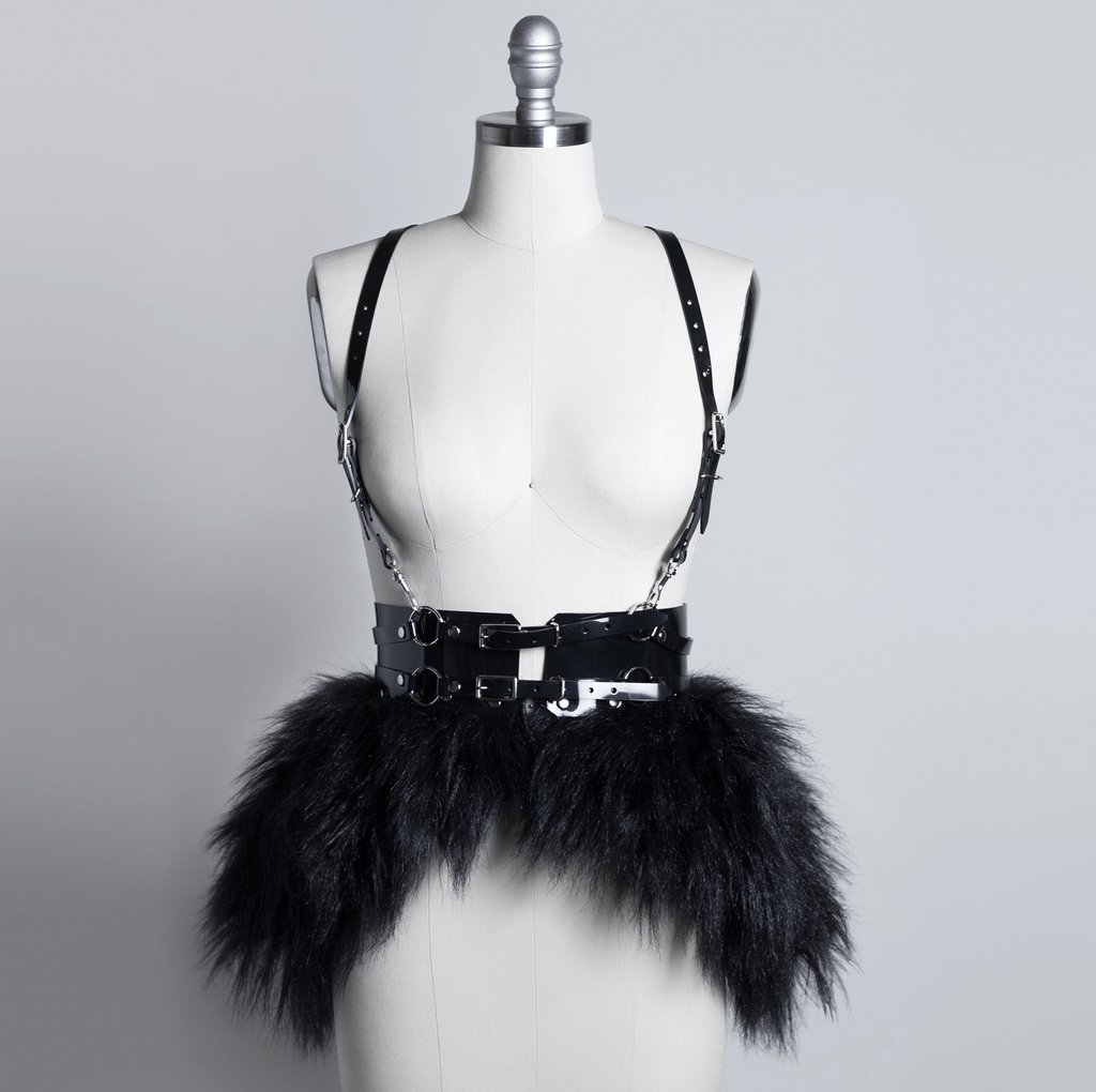 Apatico black, fur bustle PVC leather peplum harness on Mannequin. 