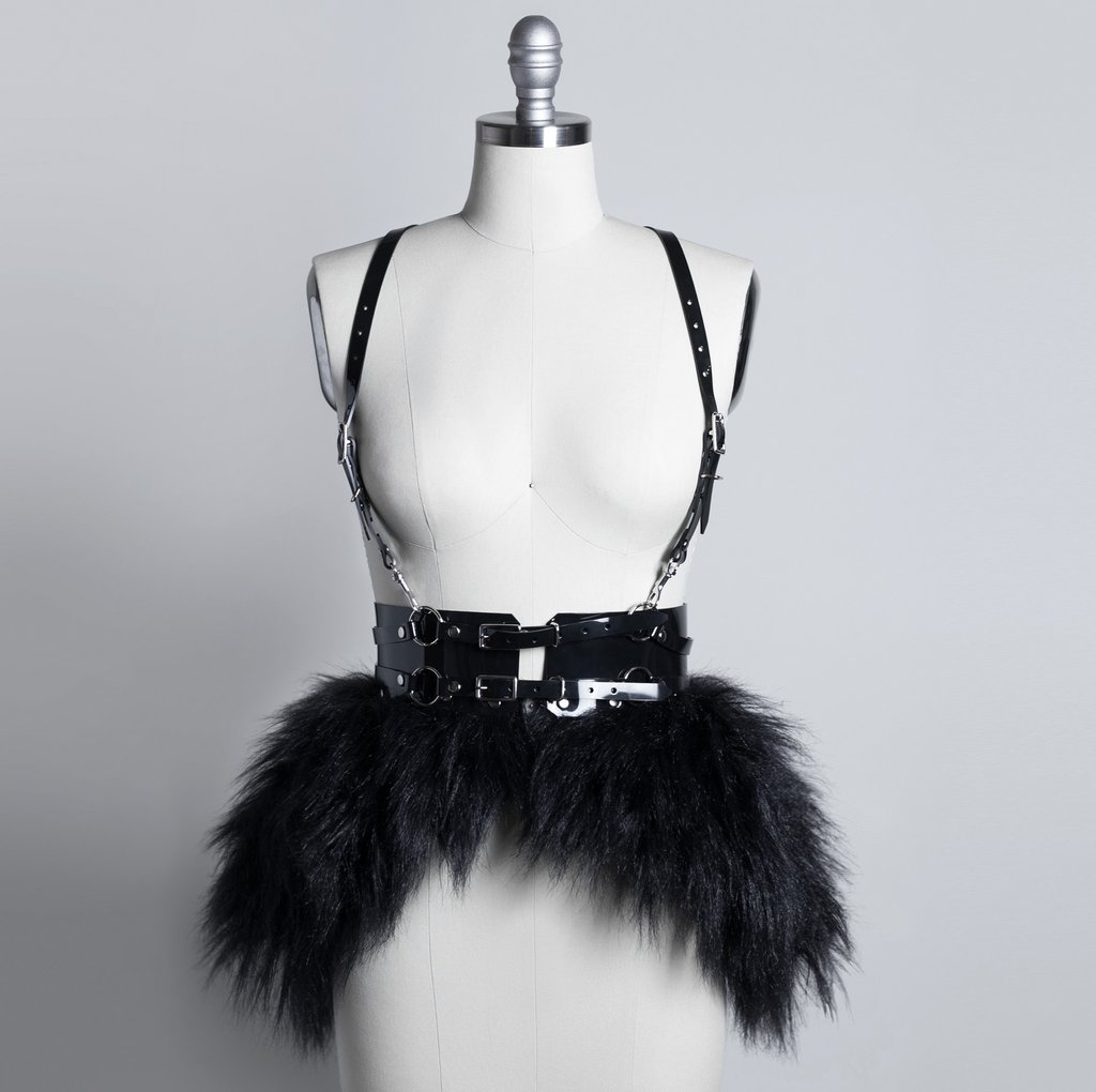 Apatico black, fur bustle PVC leather peplum harness on Mannequin.