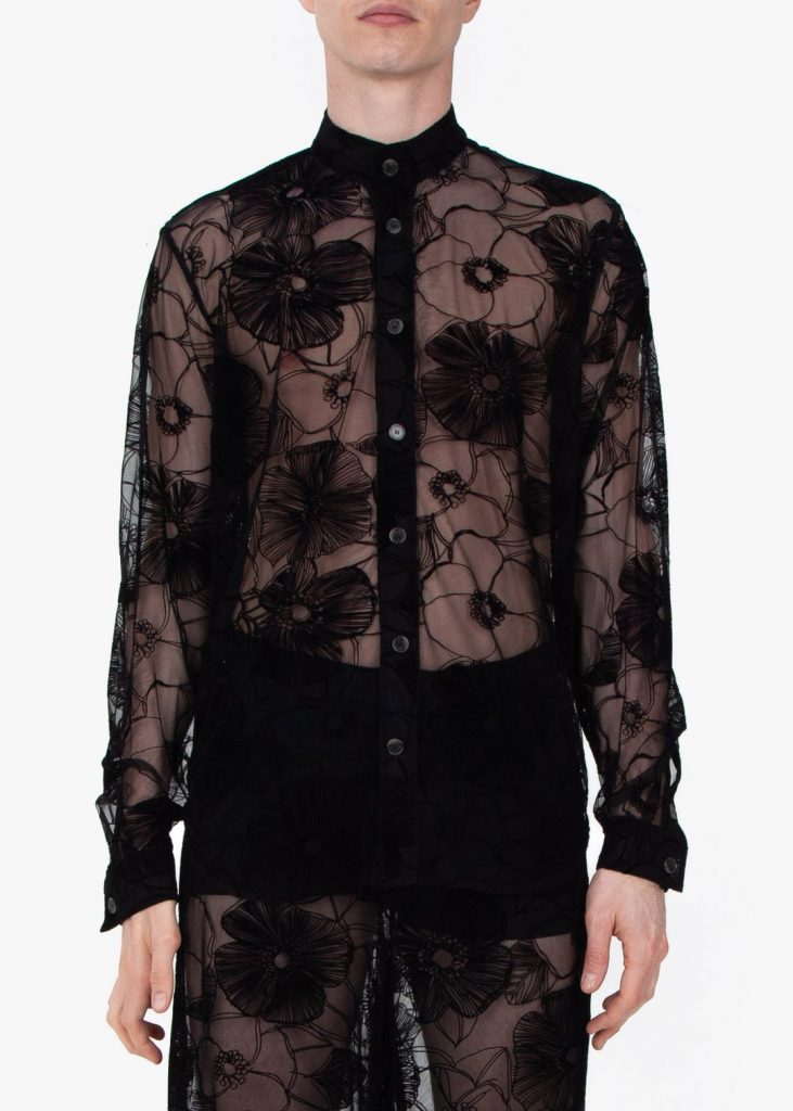 Upper front profile, Fomme Gender Neutral Black Lace Pajamas with flower-patterned flocking. Long sleeve, button up, mesh, shirt.