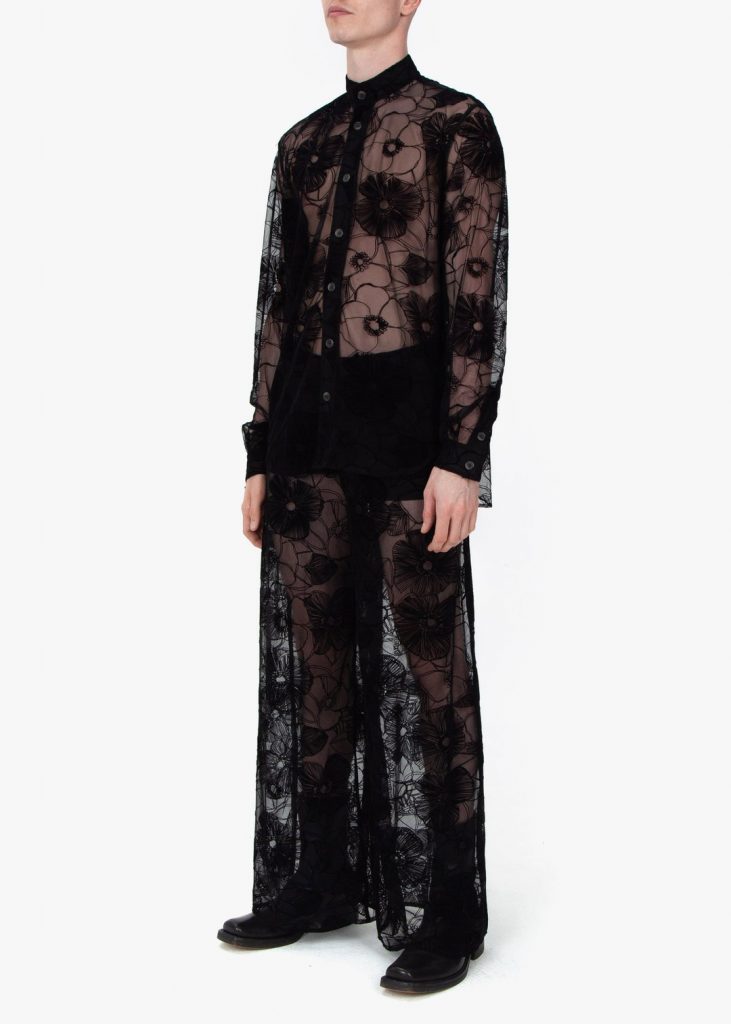 Fomme Gender Neutral Black Lace Pajamas with flower-patterned flocking. Long sleeve shirt, and wide leg pants.