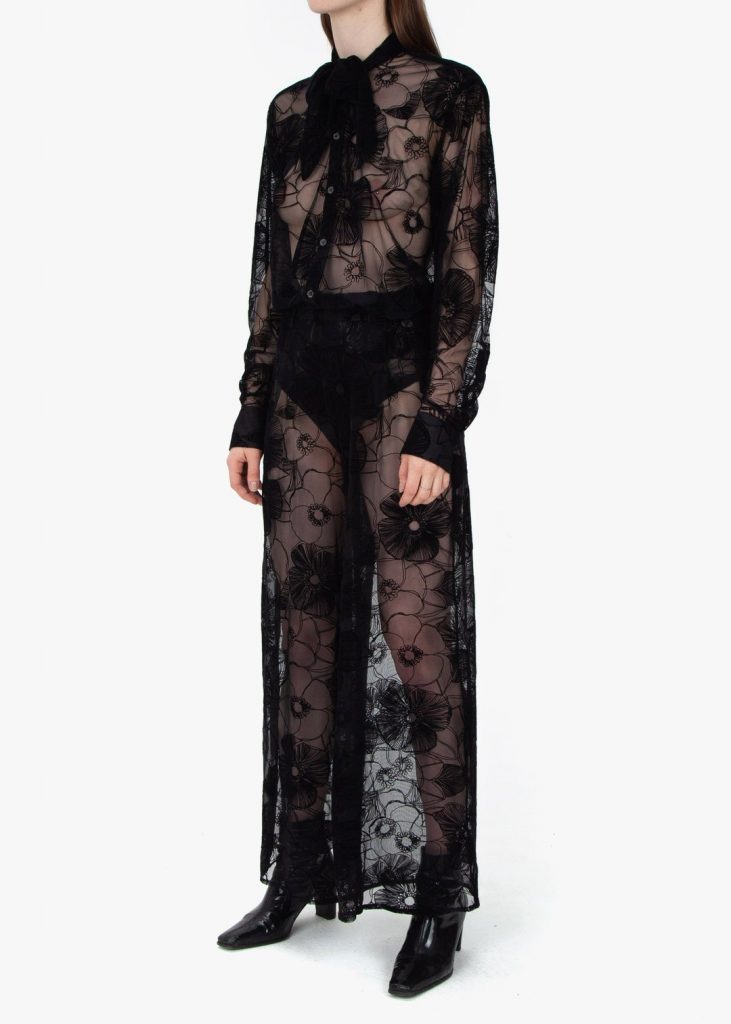 Fomme Gender Neutral Black Lace Pajamas with flower-patterned flocking. Black neckerchief, Long sleeve shirt, and wide leg pants.