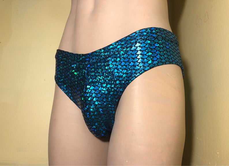 Rainbow Rears Accentuating Swim Bottoms which allow packing while swimming