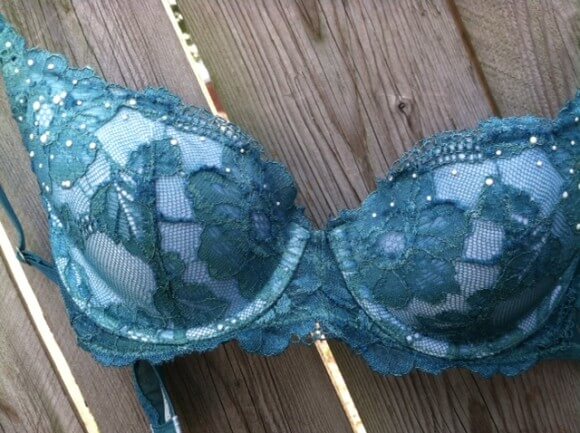 Poly bra with a nylon lace overlay, when dyed, means that there's a dark ivy pattern on a light background. 