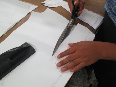 Cutting a sample garment