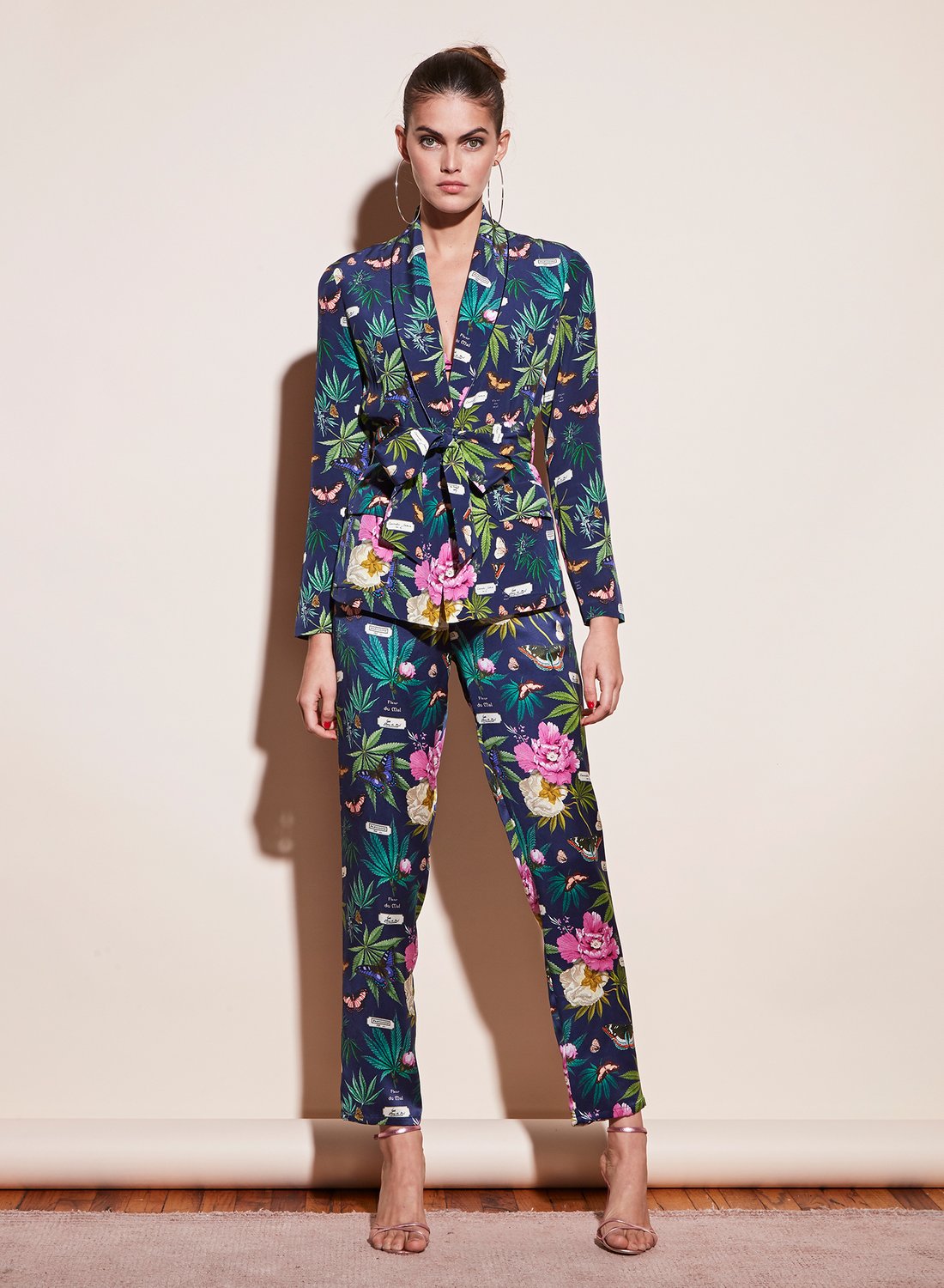 In Fleur du Mal's "Papillon" print, the cannabis leaf is almost hidden among other botanicals