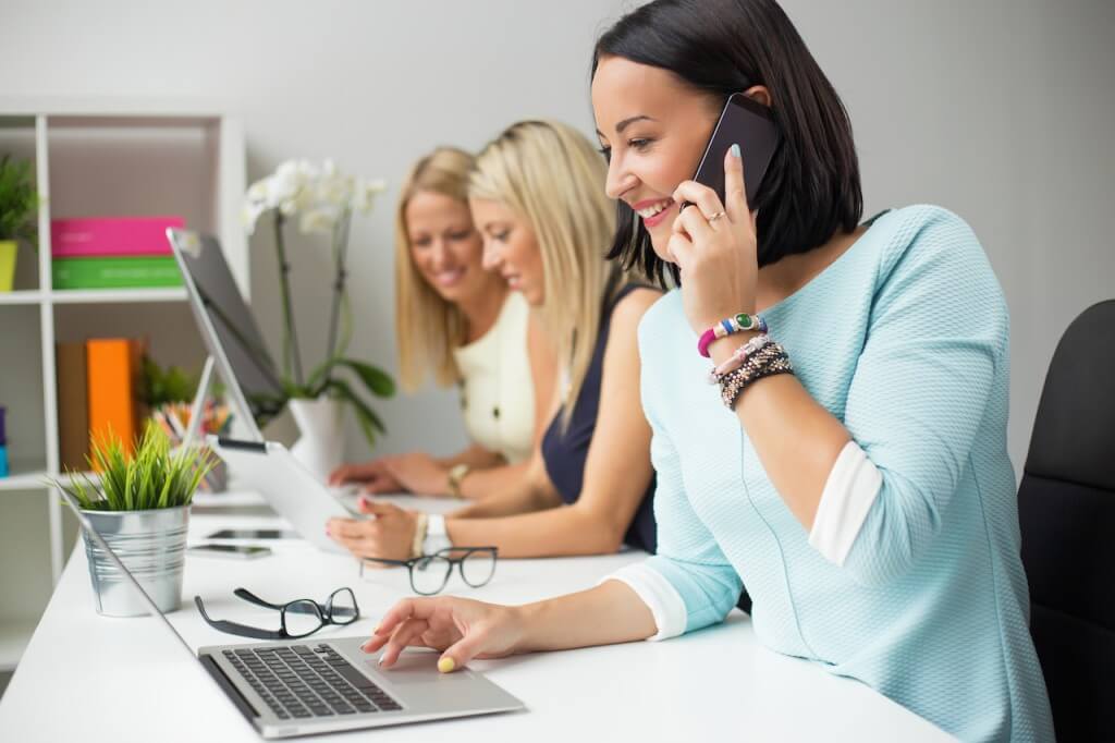 Creative women colleagues working in the office